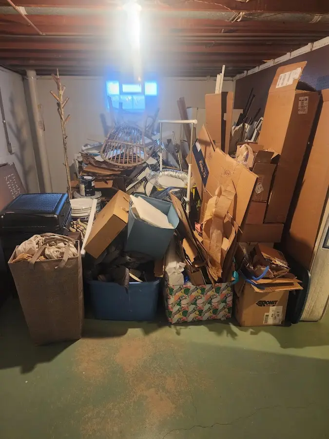 Roll-off dumpster container at job site for 15 Yard Dumpster Rental in Elba